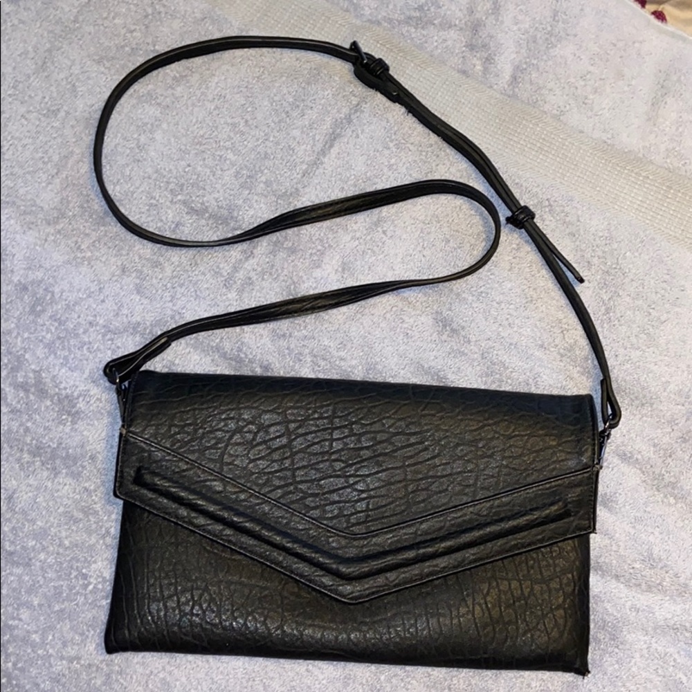 Black leather material crossbody bag/ clutch